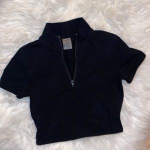 Black half zip TNA crop top